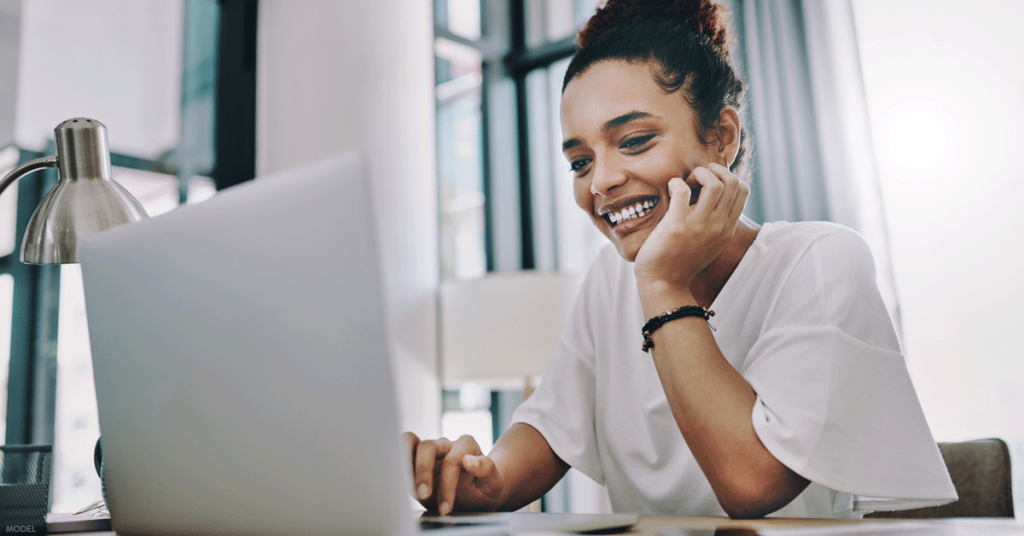 Woman in Atlanta, GA on a Zoom call considering facial rejuvenation options