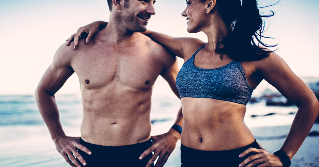 Woman and man exercising together