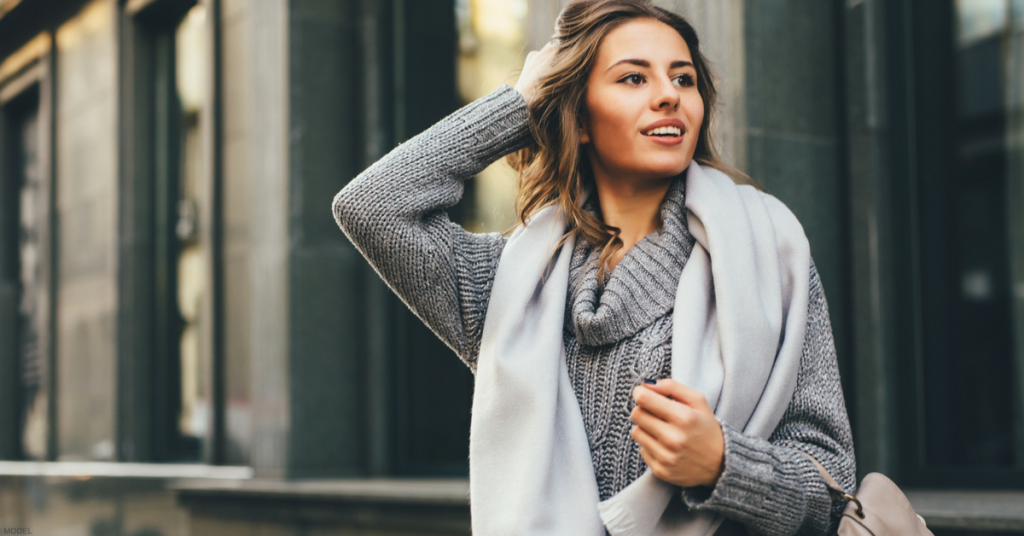 Woman standing in urban enviornment